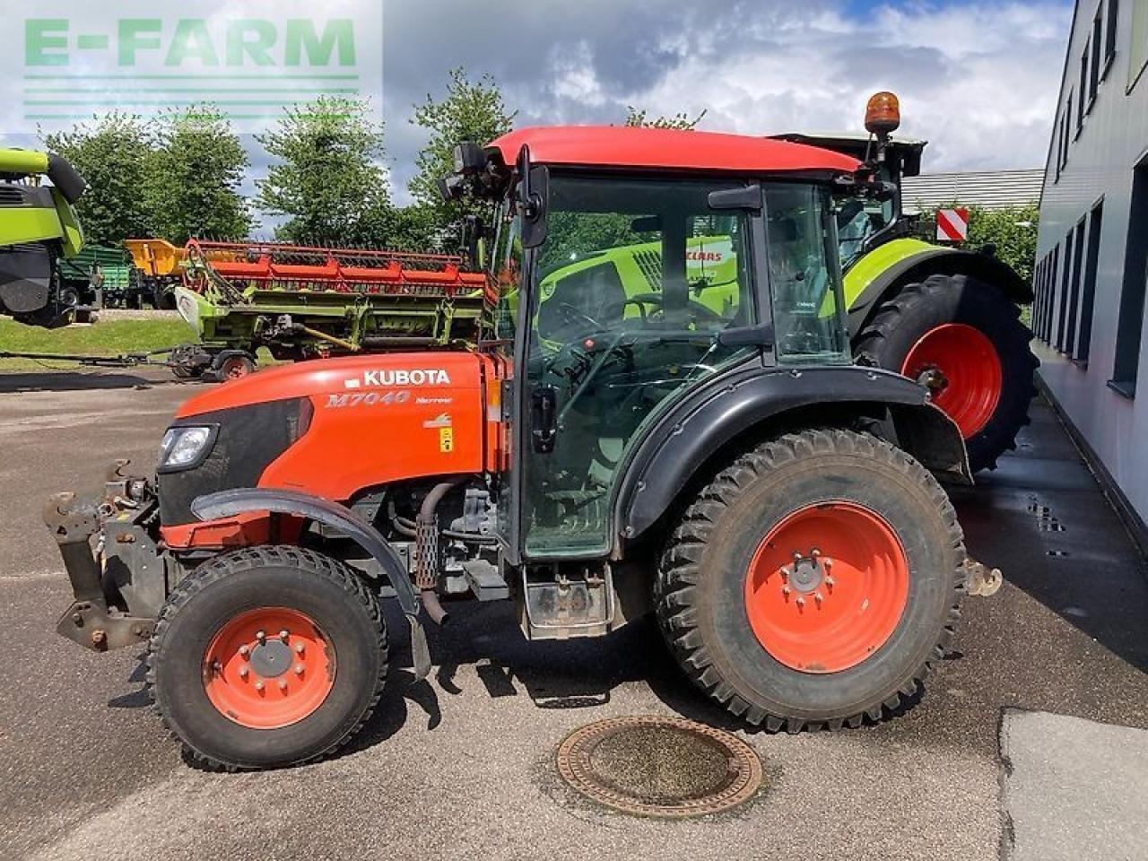 Kubota m7040 - Tractor: foto 1 Kubota m7040 - Tractor: foto 1