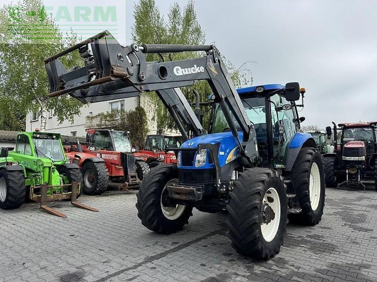 New Holland t6020 elite + quicke q55 Elite - Tractor: foto 2 New Holland t6020 elite + quicke q55 Elite - Tractor: foto 2