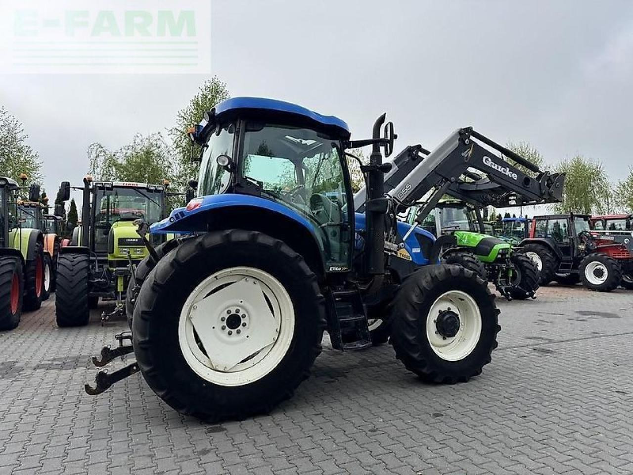 New Holland t6020 elite + quicke q55 Elite - Tractor: foto 5 New Holland t6020 elite + quicke q55 Elite - Tractor: foto 5