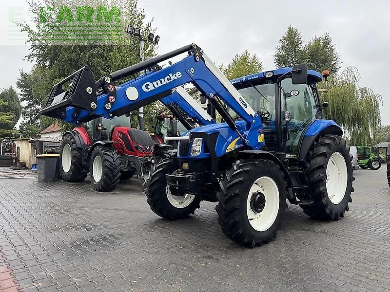 New Holland t6020 elite + quicke q55 Elite - Tractor: foto 1 New Holland t6020 elite + quicke q55 Elite - Tractor: foto 1