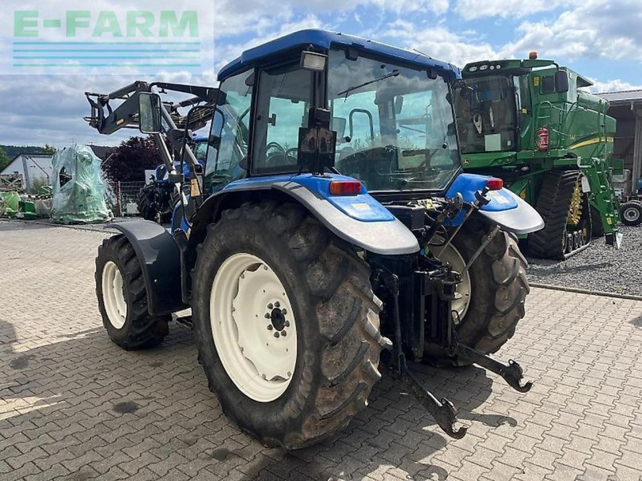 New Holland tl 90 a A - Tractor: foto 4 New Holland tl 90 a A - Tractor: foto 4