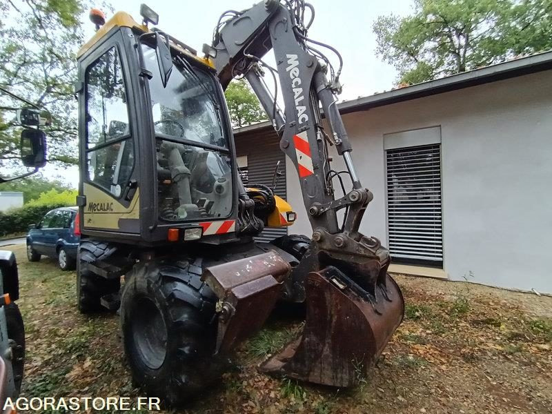 Pelle à roues Mecalac 12MTX TBE - Excavadora: foto 1 Pelle à roues Mecalac 12MTX TBE - Excavadora: foto 1