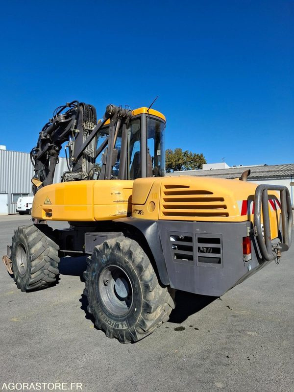 Pelle sur pneus MECALAC 12MTX - N° série 42770 - 2014 - 11400 heures - Excavadora: foto 3 Pelle sur pneus MECALAC 12MTX - N° série 42770 - 2014 - 11400 heures - Excavadora: foto 3