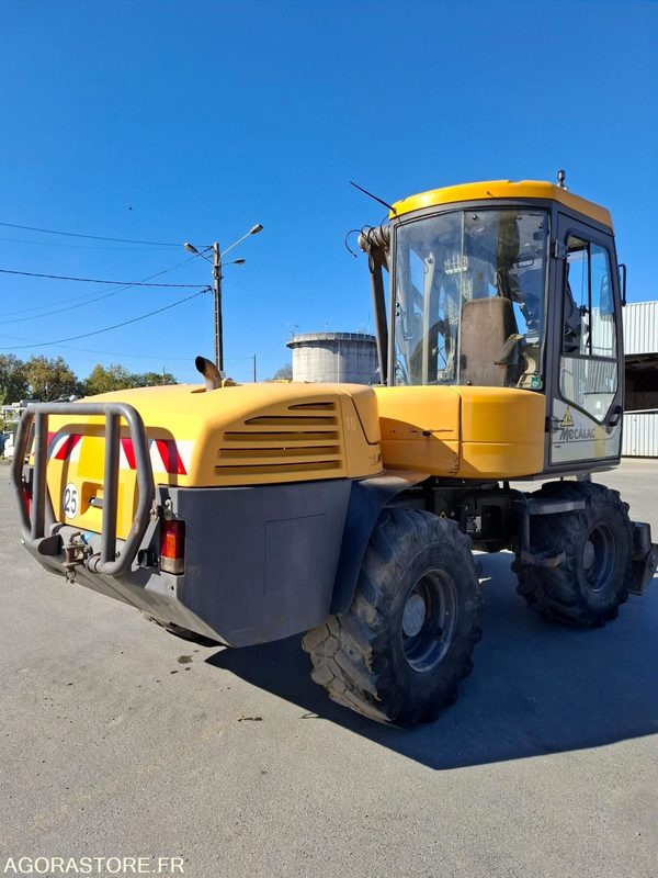 Pelle sur pneus MECALAC 12MTX - N° série 42770 - 2014 - 11400 heures - Excavadora: foto 1 Pelle sur pneus MECALAC 12MTX - N° série 42770 - 2014 - 11400 heures - Excavadora: foto 1