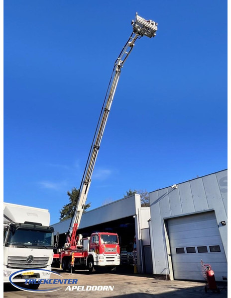 MAN TGA 26.350 Magirus ALP 320L = 32 meter, Waterpump, 6x4, Steel springs - Camión: foto 1 MAN TGA 26.350 Magirus ALP 320L = 32 meter, Waterpump, 6x4, Steel springs - Camión: foto 1