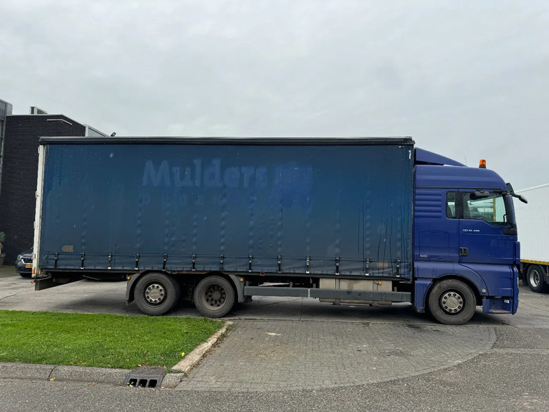 MAN TGX 26.400 6X2 - EURO 4 + LIFT + STEERING AXLE + TÜV 10-2025 - Camión lona: foto 4 MAN TGX 26.400 6X2 - EURO 4 + LIFT + STEERING AXLE + TÜV 10-2025 - Camión lona: foto 4