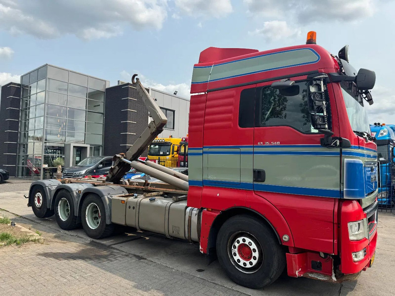 MAN TGX 35.540 - 8X4 - EURO 5 + AJK HOOK + LIFT/STEE - Camión multibasculante: foto 3 MAN TGX 35.540 - 8X4 - EURO 5 + AJK HOOK + LIFT/STEE - Camión multibasculante: foto 3