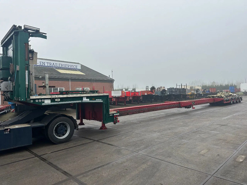 MEUSBURGER 4 axel steering, Double extendable up to 28 meters, extendable up to 3.2 meters, radio controlled, sliding roof - Semirremolque góndola rebajadas: foto 1 MEUSBURGER 4 axel steering, Double extendable up to 28 meters, extendable up to 3.2 meters, radio controlled, sliding roof - Semirremolque góndola rebajadas: foto 1