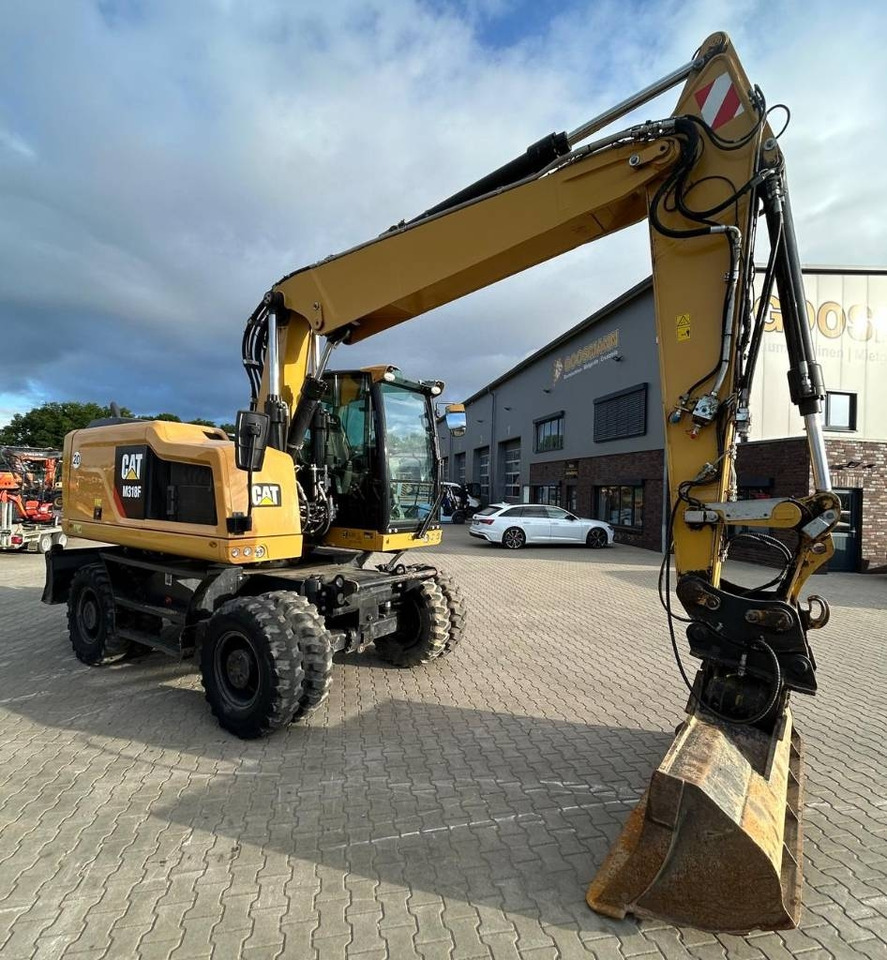 CAT M 318 F - Excavadora de ruedas: foto 1 CAT M 318 F - Excavadora de ruedas: foto 1
