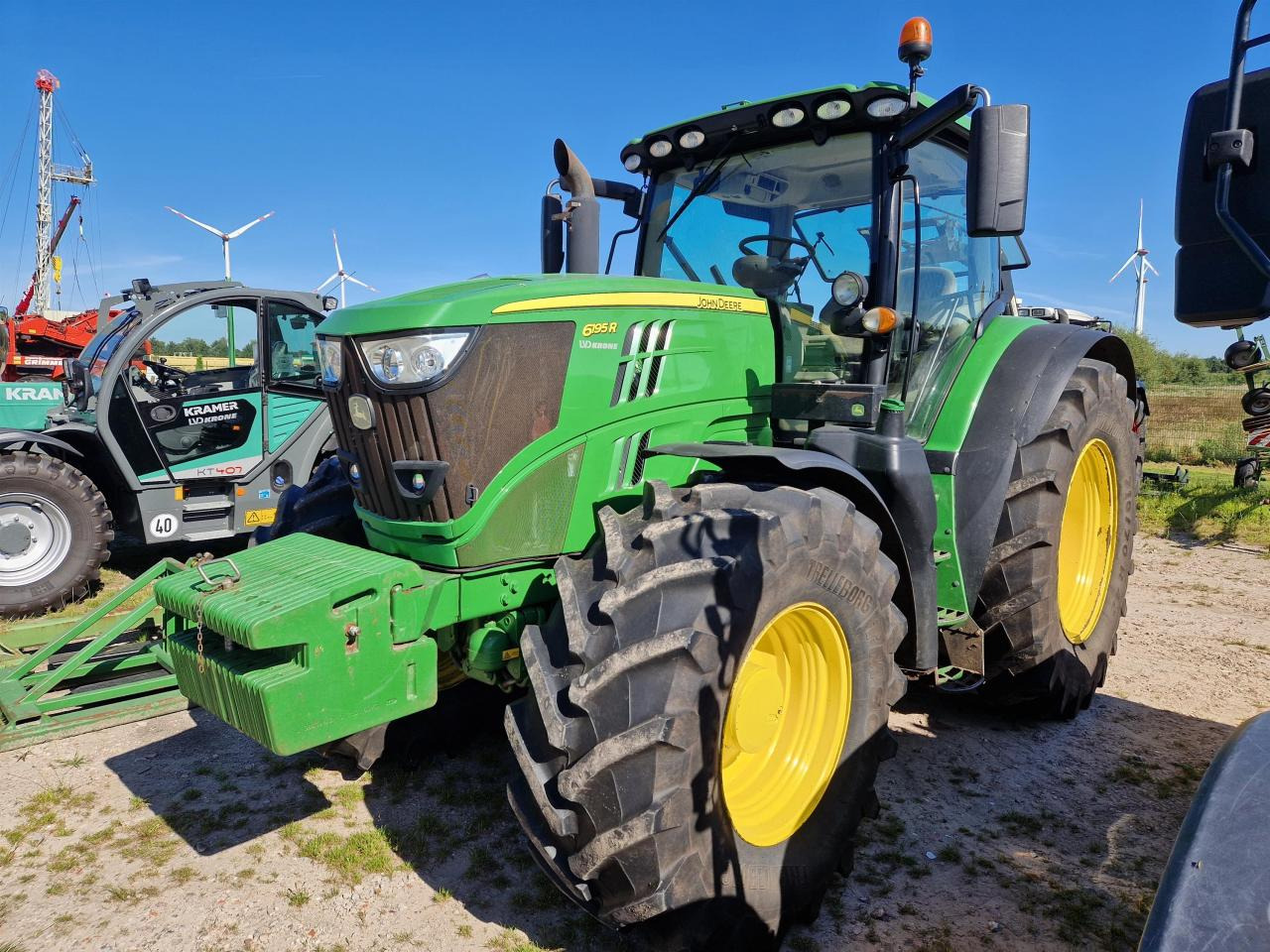 John Deere 6195R - Tractor: foto 1 John Deere 6195R - Tractor: foto 1
