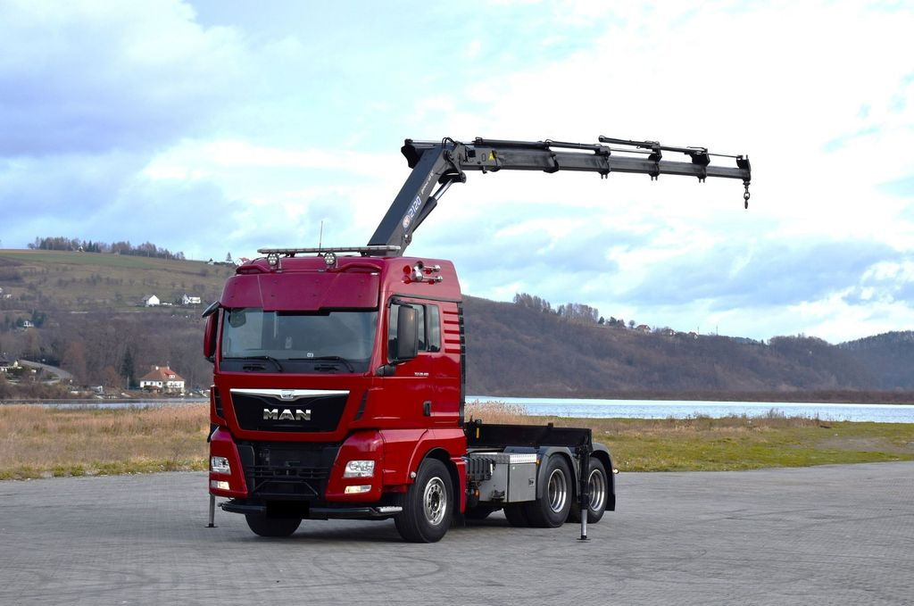 MAN TGX 28.480 Sattelzugmaschine + HMF 2120 K5/FUNK MAN TGX 28.480 Sattelzugmaschine + HMF 2120 K5/FUNK - Cabeza tractora: foto 2 MAN TGX 28.480 Sattelzugmaschine + HMF 2120 K5/FUNK MAN TGX 28.480 Sattelzugmaschine + HMF 2120 K5/FUNK - Cabeza tractora: foto 2