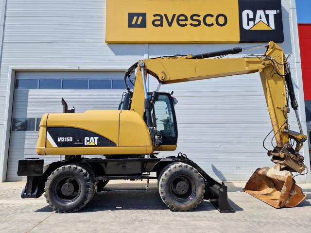 CATERPILLAR M315 - Excavadora de ruedas: foto 4 CATERPILLAR M315 - Excavadora de ruedas: foto 4