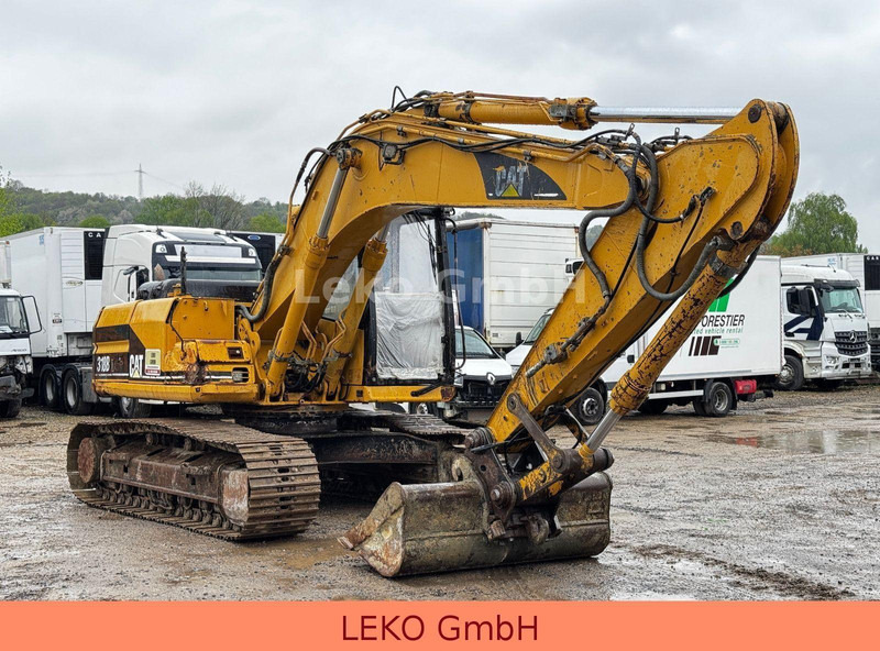 Caterpillar 318B Mit Zwei Löffeln - Excavadora de cadenas: foto 1 Caterpillar 318B Mit Zwei Löffeln - Excavadora de cadenas: foto 1