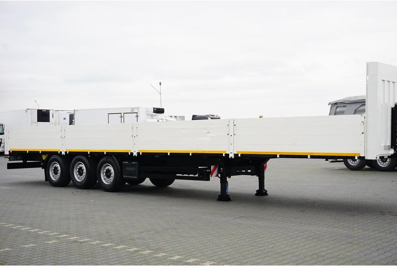 Kögel BURTOWA / BUDOWLANA / OŚ PODNOSZONA - Semirremolque plataforma/ Caja abierta: foto 4 Kögel BURTOWA / BUDOWLANA / OŚ PODNOSZONA - Semirremolque plataforma/ Caja abierta: foto 4