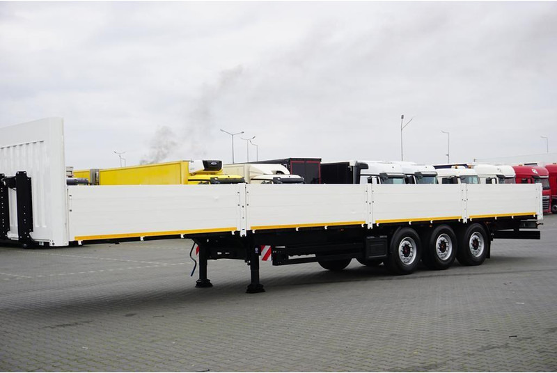 Kögel BURTOWA / BUDOWLANA / OŚ PODNOSZONA - Semirremolque plataforma/ Caja abierta: foto 3 Kögel BURTOWA / BUDOWLANA / OŚ PODNOSZONA - Semirremolque plataforma/ Caja abierta: foto 3