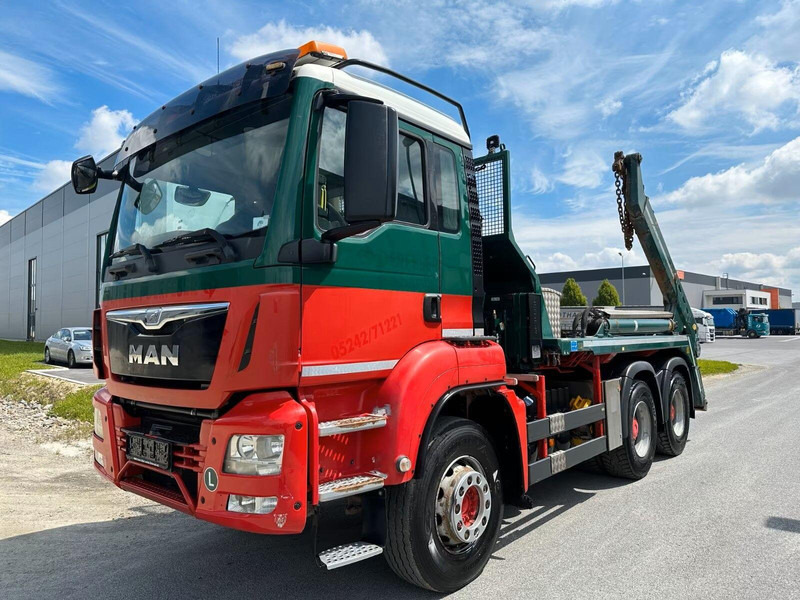 MAN TGS 26.400 - Meiller AK 16 MT Absetzkipper - Camión portacontenedor de cadenas: foto 1 MAN TGS 26.400 - Meiller AK 16 MT Absetzkipper - Camión portacontenedor de cadenas: foto 1