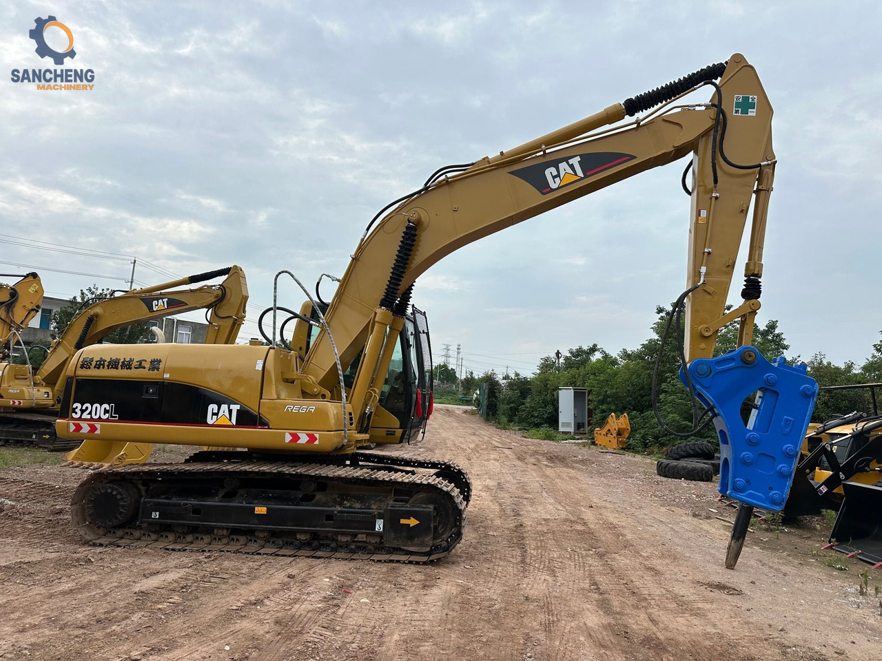 CAT 320CL with hammer - Excavadora de cadenas: foto 1 CAT 320CL with hammer - Excavadora de cadenas: foto 1
