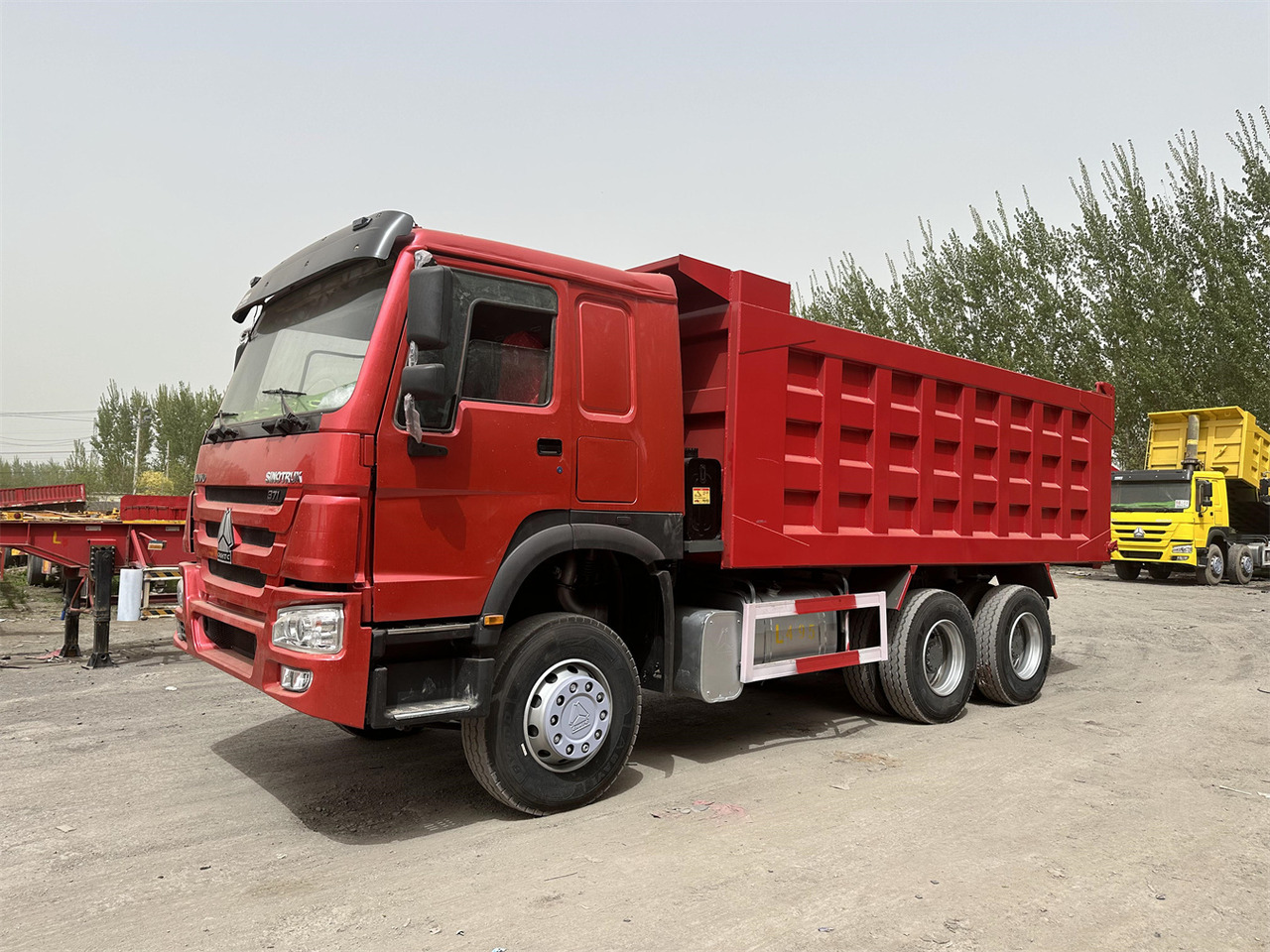 SINOTRUK Howo Dump truck 371 - Camión volquete: foto 1 SINOTRUK Howo Dump truck 371 - Camión volquete: foto 1
