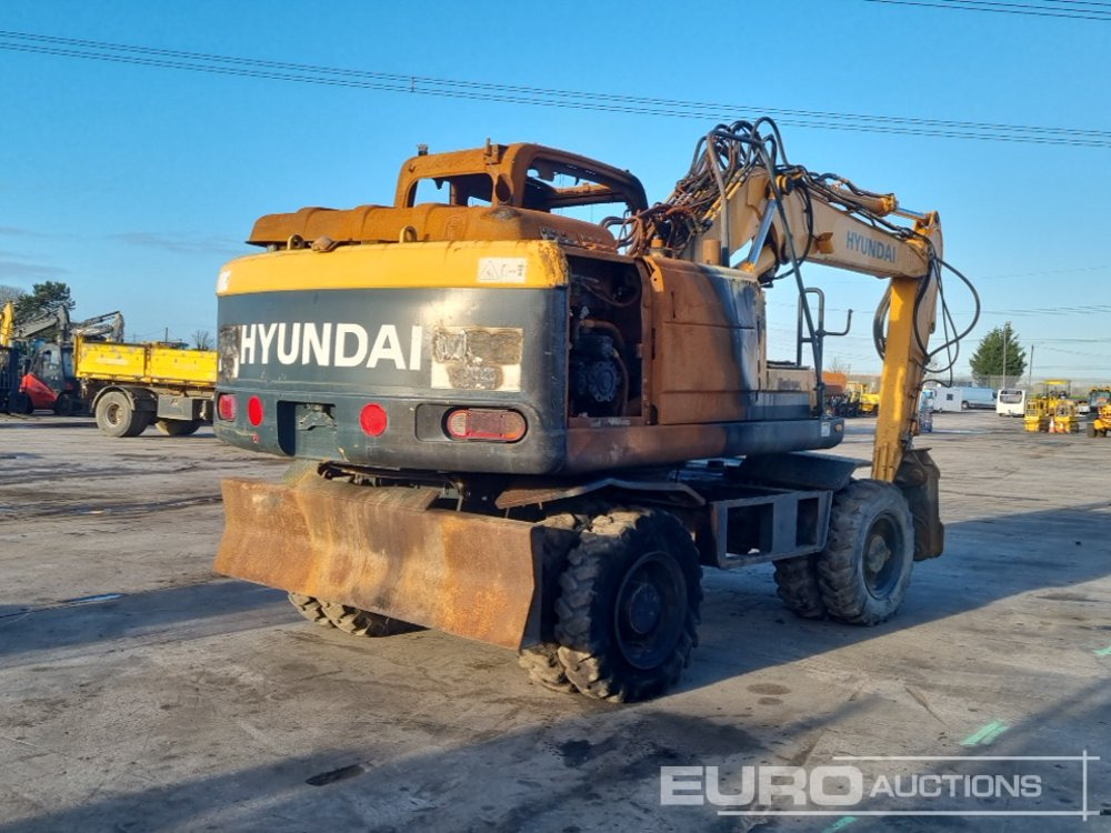 2013 Hyundai ROBEX140W-9 - Excavadora de ruedas: foto 5 2013 Hyundai ROBEX140W-9 - Excavadora de ruedas: foto 5