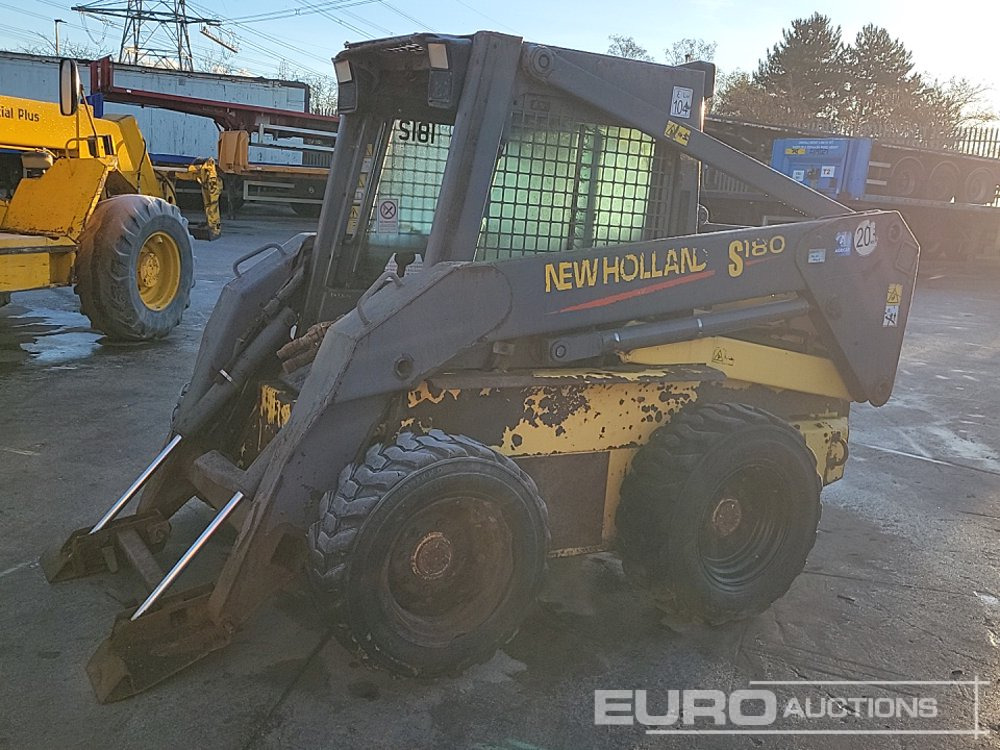 New Holland LS180 - Minicargadora: foto 1 New Holland LS180 - Minicargadora: foto 1