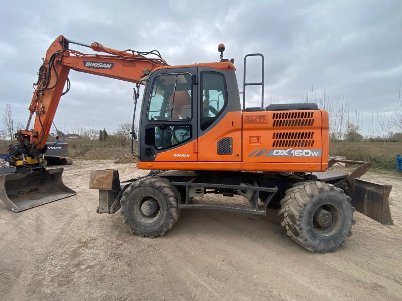 Doosan DX 160W-3 - Excavadora de ruedas: foto 1 Doosan DX 160W-3 - Excavadora de ruedas: foto 1