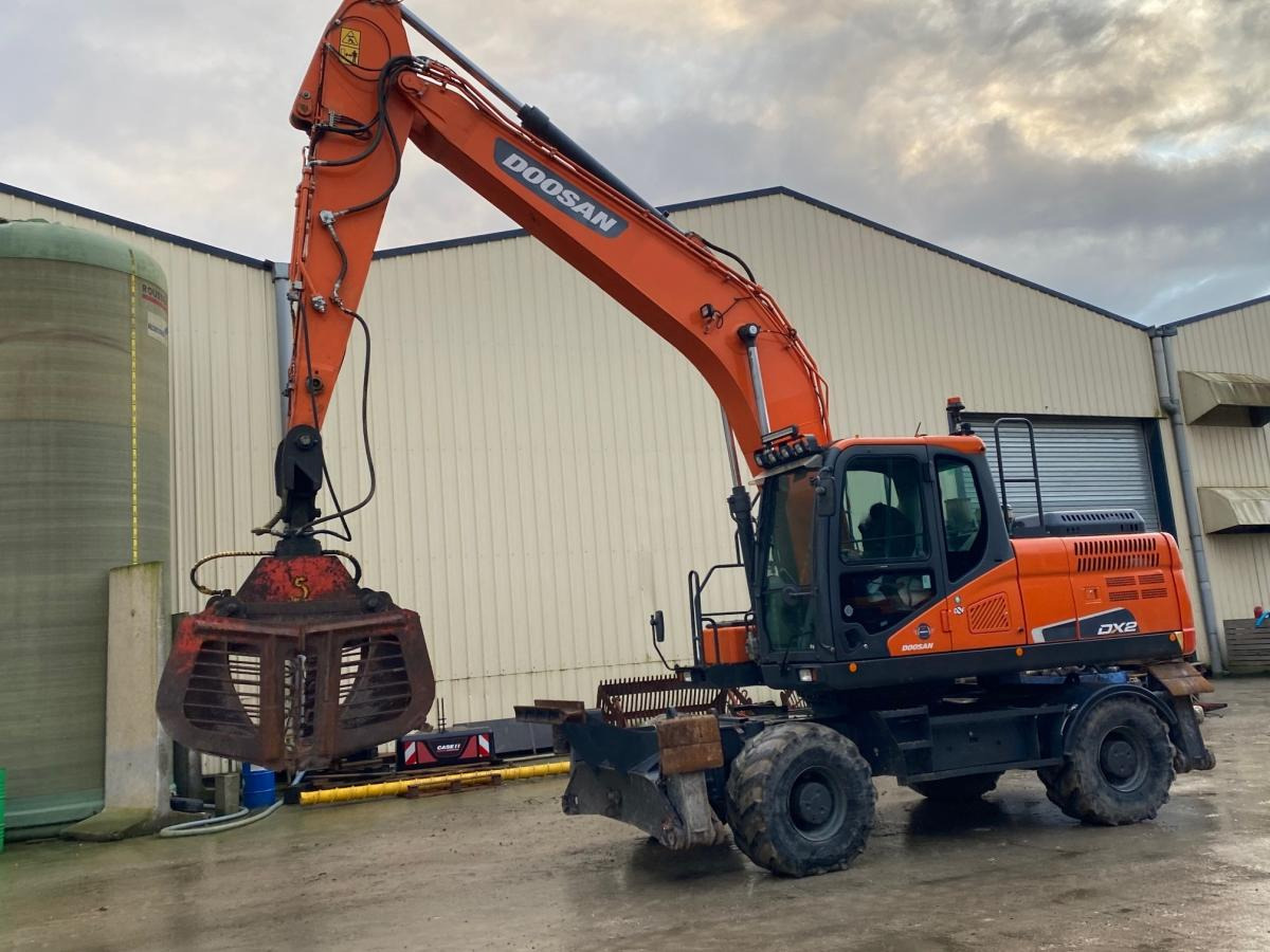 Doosan DX 210W-5 - Excavadora de ruedas: foto 1 Doosan DX 210W-5 - Excavadora de ruedas: foto 1