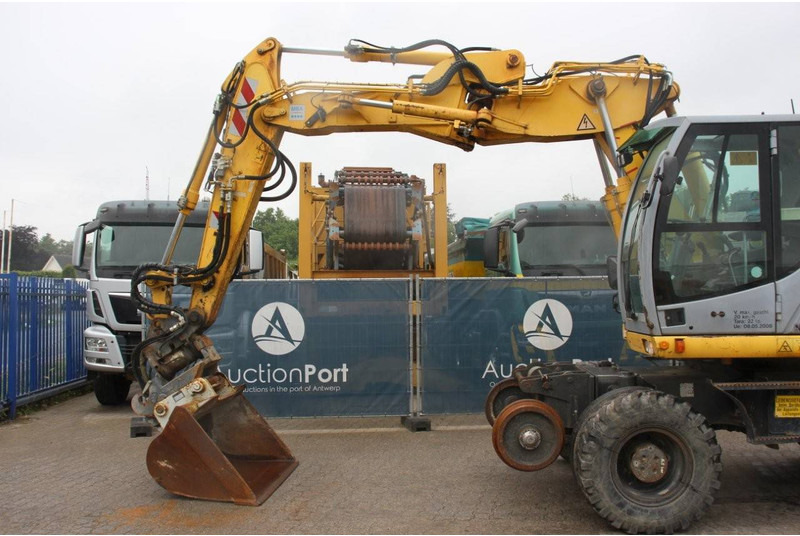 Excavadora de ruedas New Holland MH5 Plus: foto 9 Excavadora de ruedas New Holland MH5 Plus: foto 9