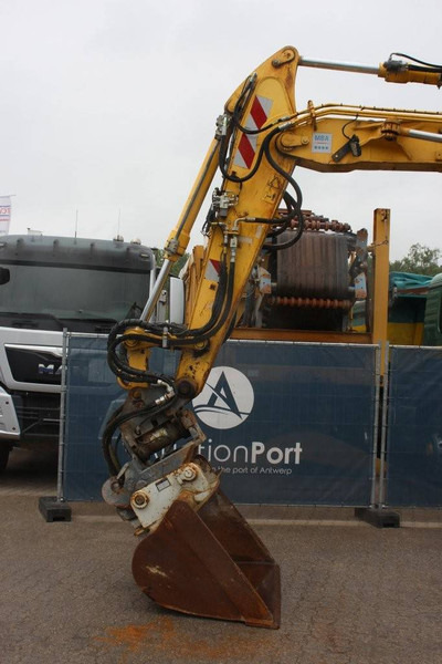 Excavadora de ruedas New Holland MH5 Plus: foto 10 Excavadora de ruedas New Holland MH5 Plus: foto 10