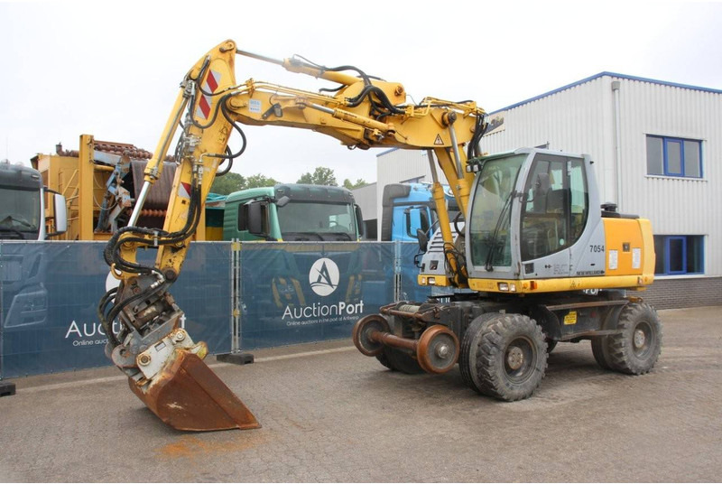 Excavadora de ruedas New Holland MH5 Plus: foto 8 Excavadora de ruedas New Holland MH5 Plus: foto 8