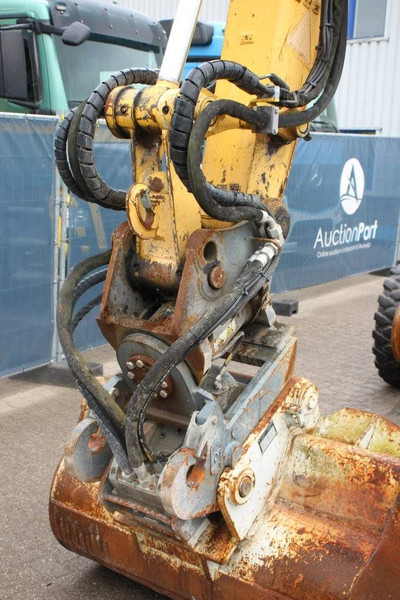 Excavadora de ruedas New Holland MH5 Plus: foto 14 Excavadora de ruedas New Holland MH5 Plus: foto 14