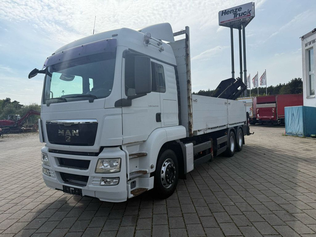 MAN TG-S 26.440 6x4 Pritsche Heckkran PK 27002+Funk - Camión caja abierta, Camión grúa: foto 1 MAN TG-S 26.440 6x4 Pritsche Heckkran PK 27002+Funk - Camión caja abierta, Camión grúa: foto 1