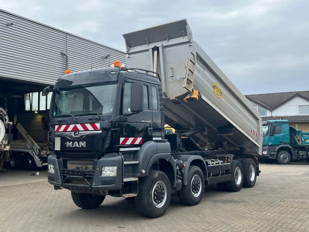 MAN TG-S 35.460 8x6 4 Achs Muldenkipper Meiller 18m³ - Camión portacontenedor de cadenas: foto 1 MAN TG-S 35.460 8x6 4 Achs Muldenkipper Meiller 18m³ - Camión portacontenedor de cadenas: foto 1
