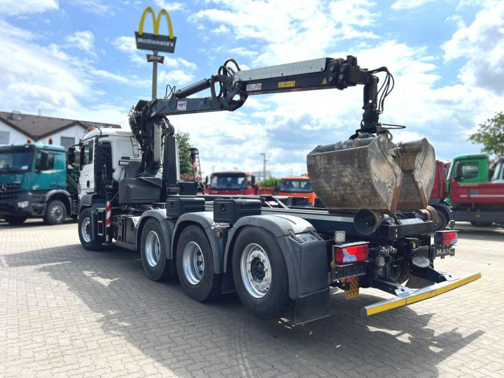 MAN TG-S 35.480 8x4 BL Abrollkipper mit Kran Penz-15 - Camión multibasculante, Camión grúa: foto 4 MAN TG-S 35.480 8x4 BL Abrollkipper mit Kran Penz-15 - Camión multibasculante, Camión grúa: foto 4
